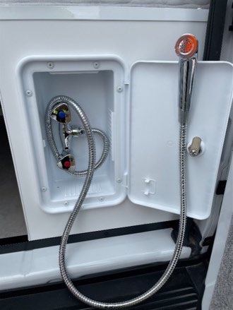 External shower button