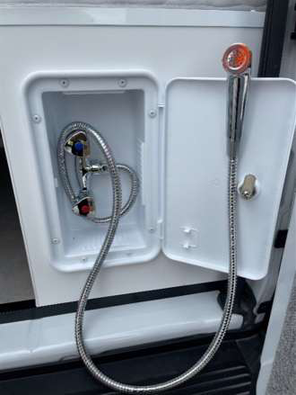 External shower button