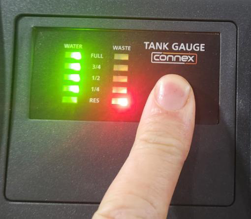 Water level test button