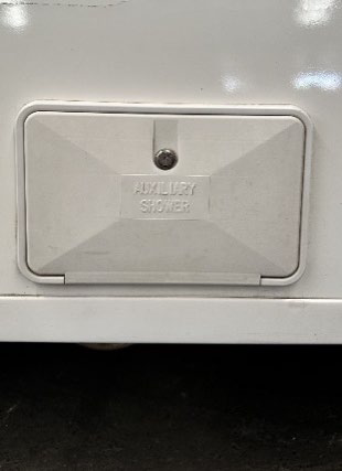 Auxiliary shower key